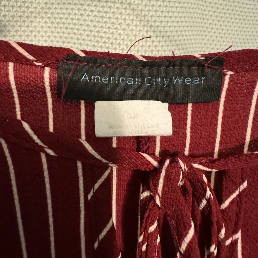 Burgundy and white striped blouse